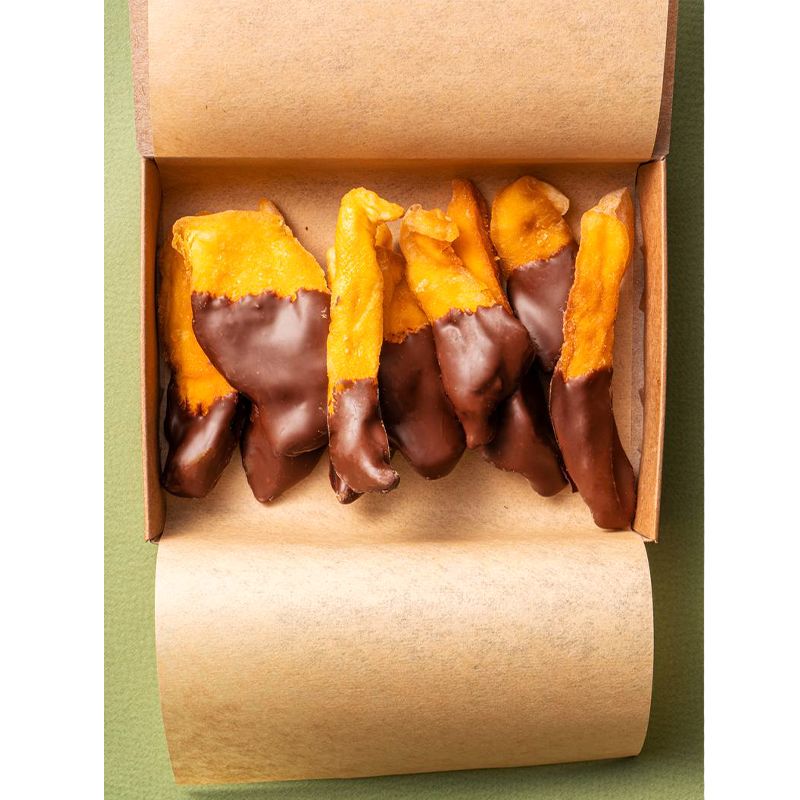 Фрукти манго, диня та персик в шоколаді, 185 г +/- 5 г в упаковці thumbnail popup