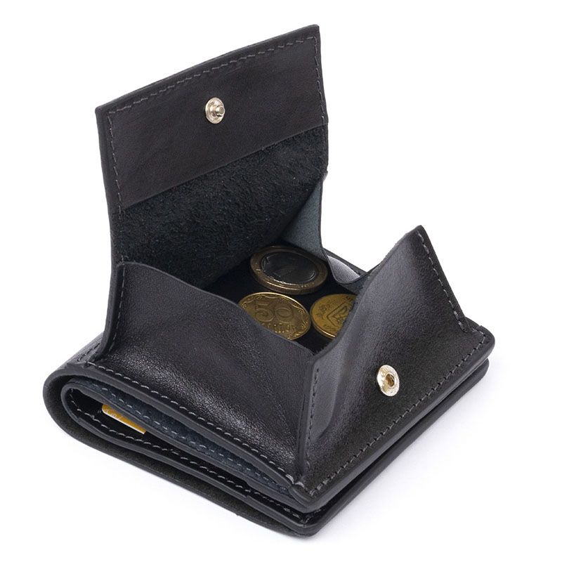 Вертикальне глянсове портмоне з накладною монетницею GRANDE PELLE 11329 Чорне thumbnail popup